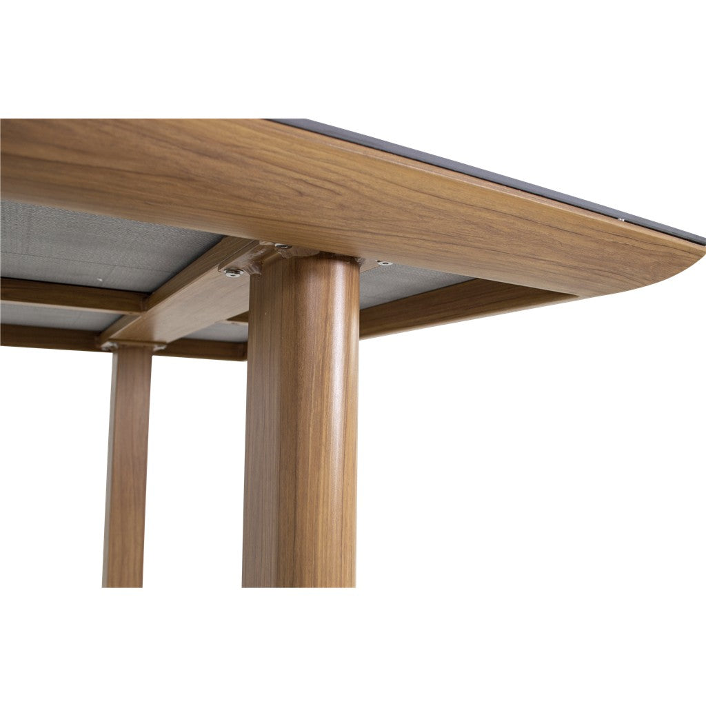 Tafel met grijs blad en zichtbare houten poten onder het blad