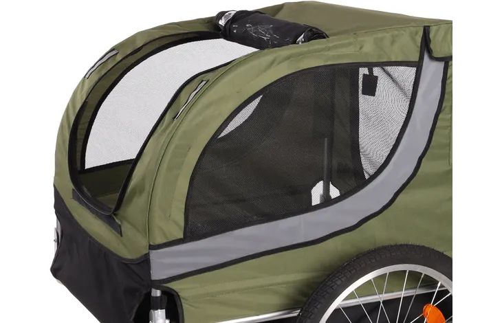 Groene fietskar met gebogen zijpanelen en mesh raampartijen, zwarte rand