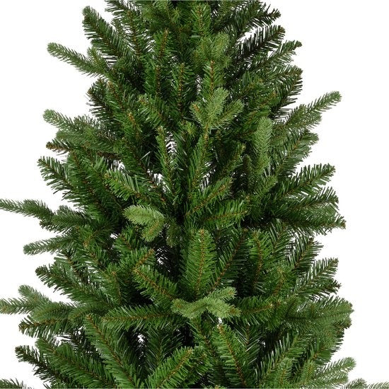Groene kunstkerstboom takken met naaldachtige bladeren