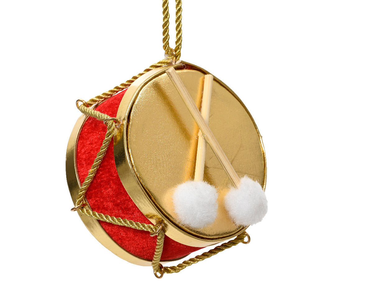 Polyester fluwelen figuur: ronde gouden trom met rode band en witte pluizen