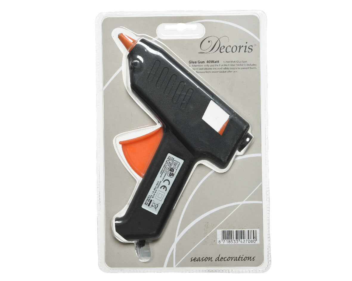 Lijmpistool in blisterverpakking, zwart kunststof met oranje mondstuk.