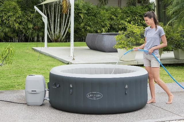 Opblaasbare spa Lay-Z-Spa Bali, ronde kuip met water en bijbehorende bediening