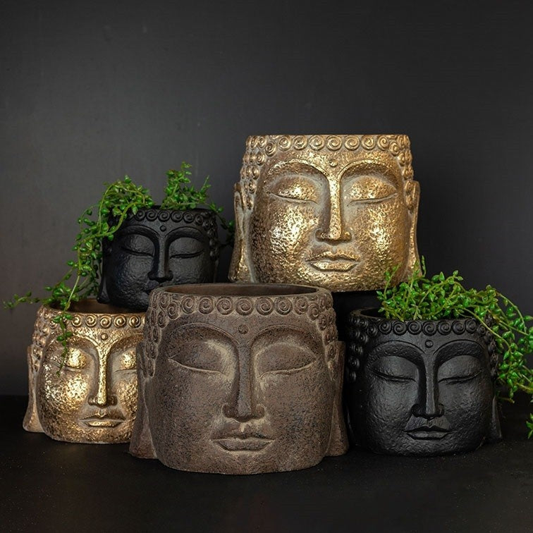 Decoratieve plantenpotten met gezichtsmotief in goud/brons en zwart, meerdere modellen