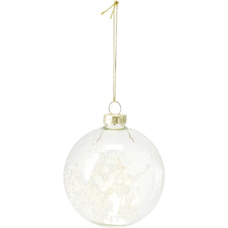 Decoratieve kerstbal van helder glas met witte bloemdecoratie en gouden ophanglus.