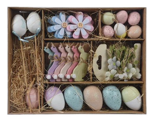 Decoratieve plastic figuurset in kartonnen doos met paaseieren en bloemen