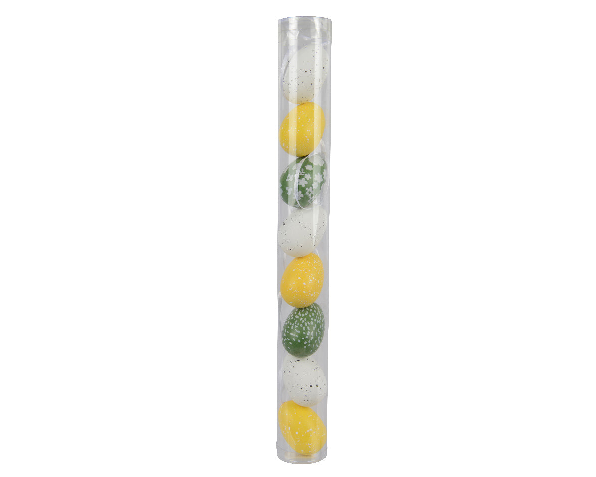 Assortiment polystyreen paaseieren in transparante verpakking: geel en groen