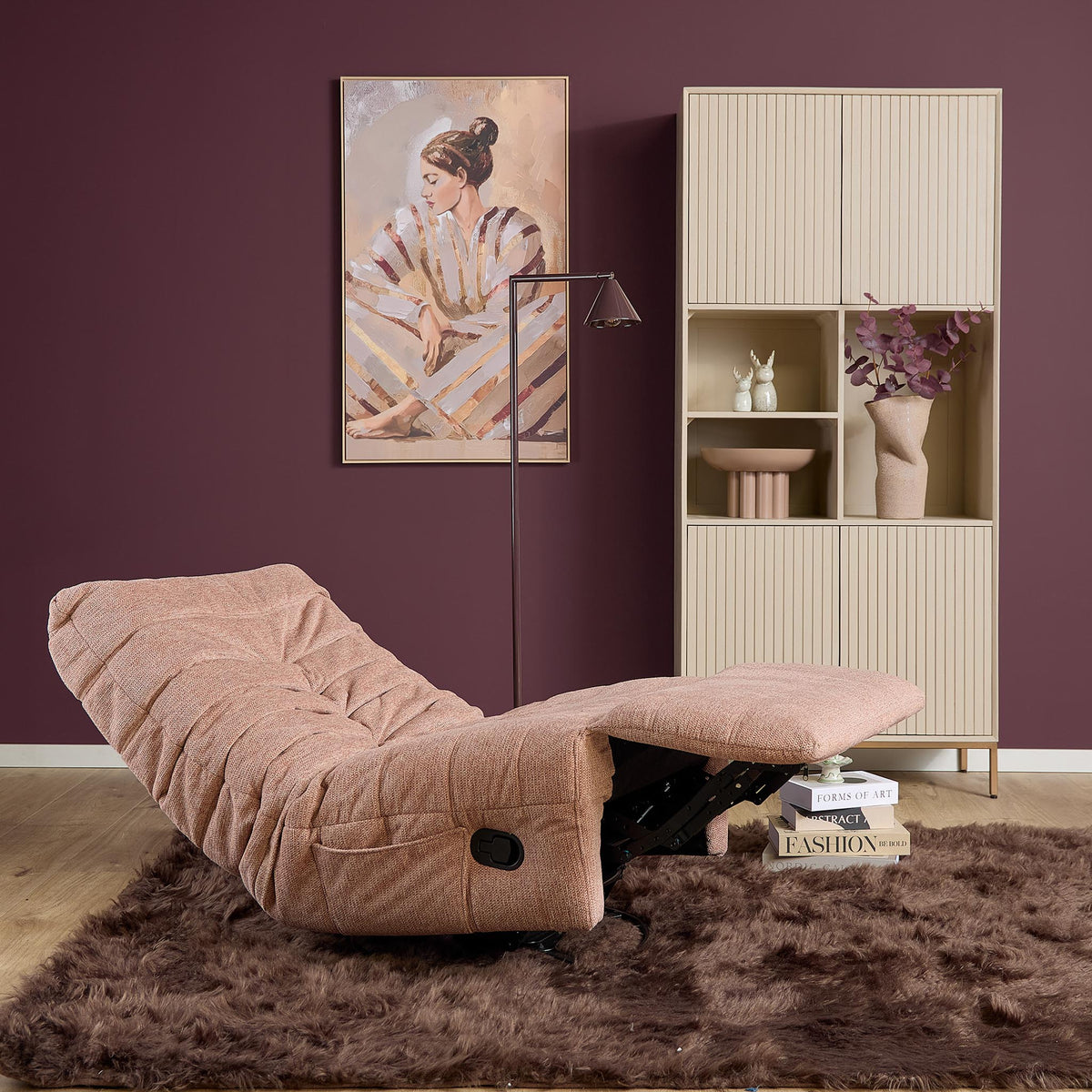 Roze relaxfauteuil Zen met opengeklapte voetensteun en opgevulde armleuningen