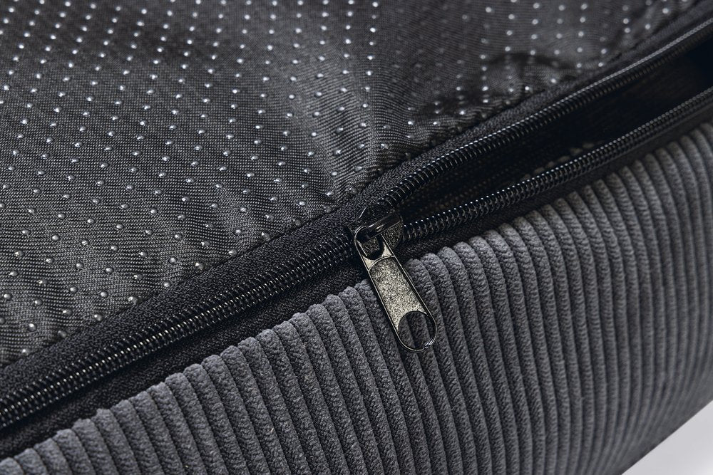 Donkergrijze hondenmand: ritsdetail en geribde zijkant