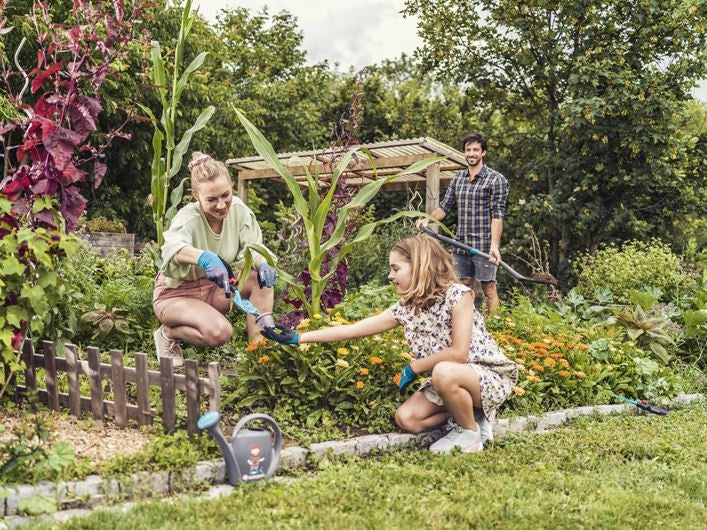 Gardena tuinhandschoenen turquoise en grijs, met zwarte gripnoppen op de handpalmen.
