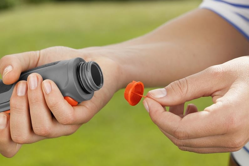 Gardena multifunctionele broes met grijze koppeling en oranje schuifschakelaar