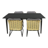 Eethoek met zwart tafelblad en 2 rotan stoelen met grijze kussens