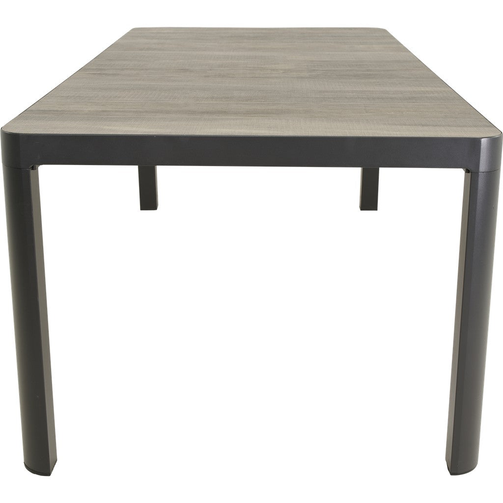 Rechthoekige eettafel met grijs houtlook blad en zwarte poten, bovenaanzicht