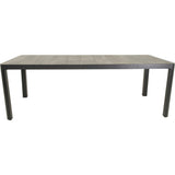 Rechthoekige eettafel met grijs houtlook blad en vier zwarte poten
