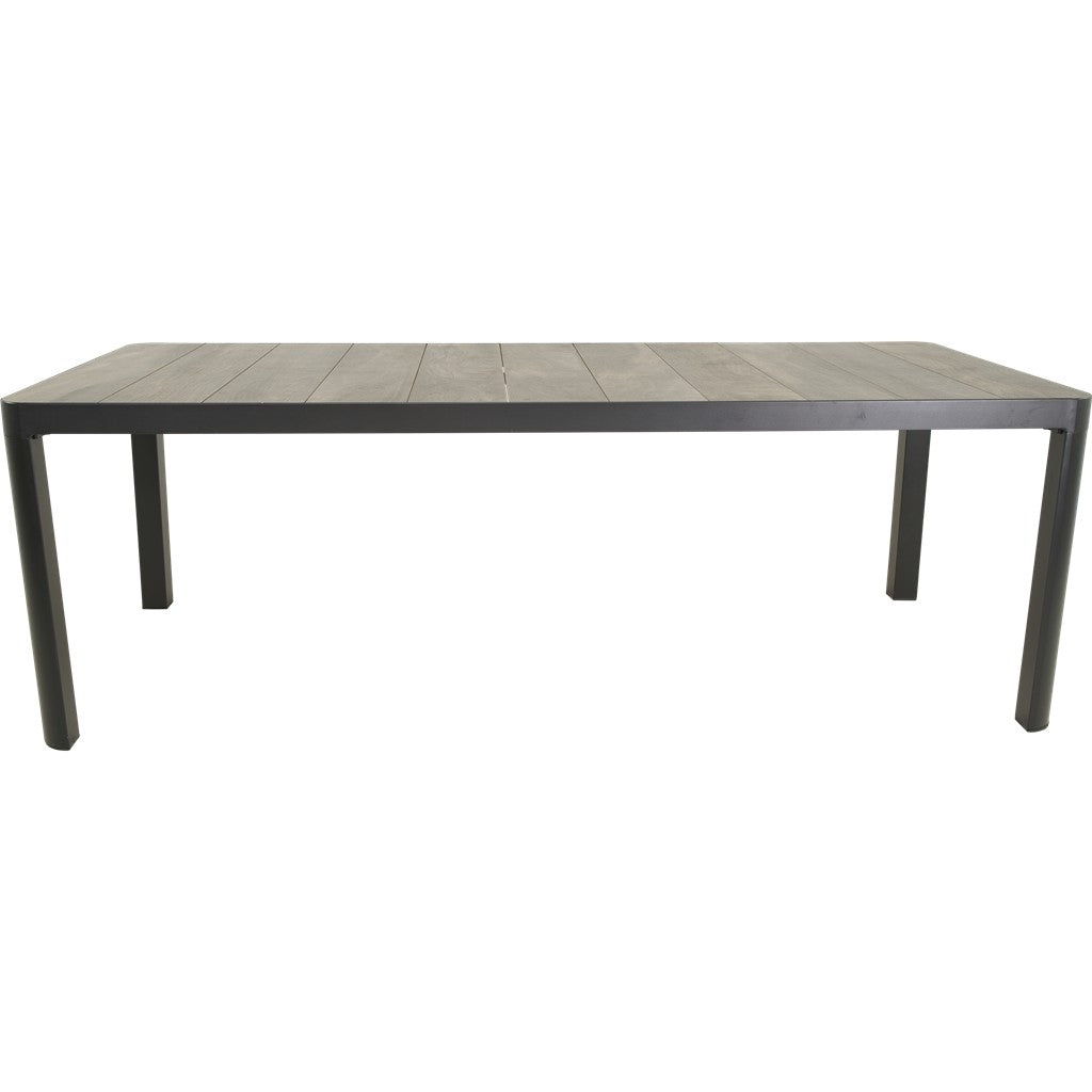 Rechthoekige eettafel met grijs houtlook blad en vier zwarte poten