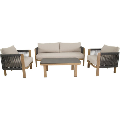 Loungeset met bank, twee fauteuils en lage tafel; lichtgrijze kussens en zwarte vlechtpanelen