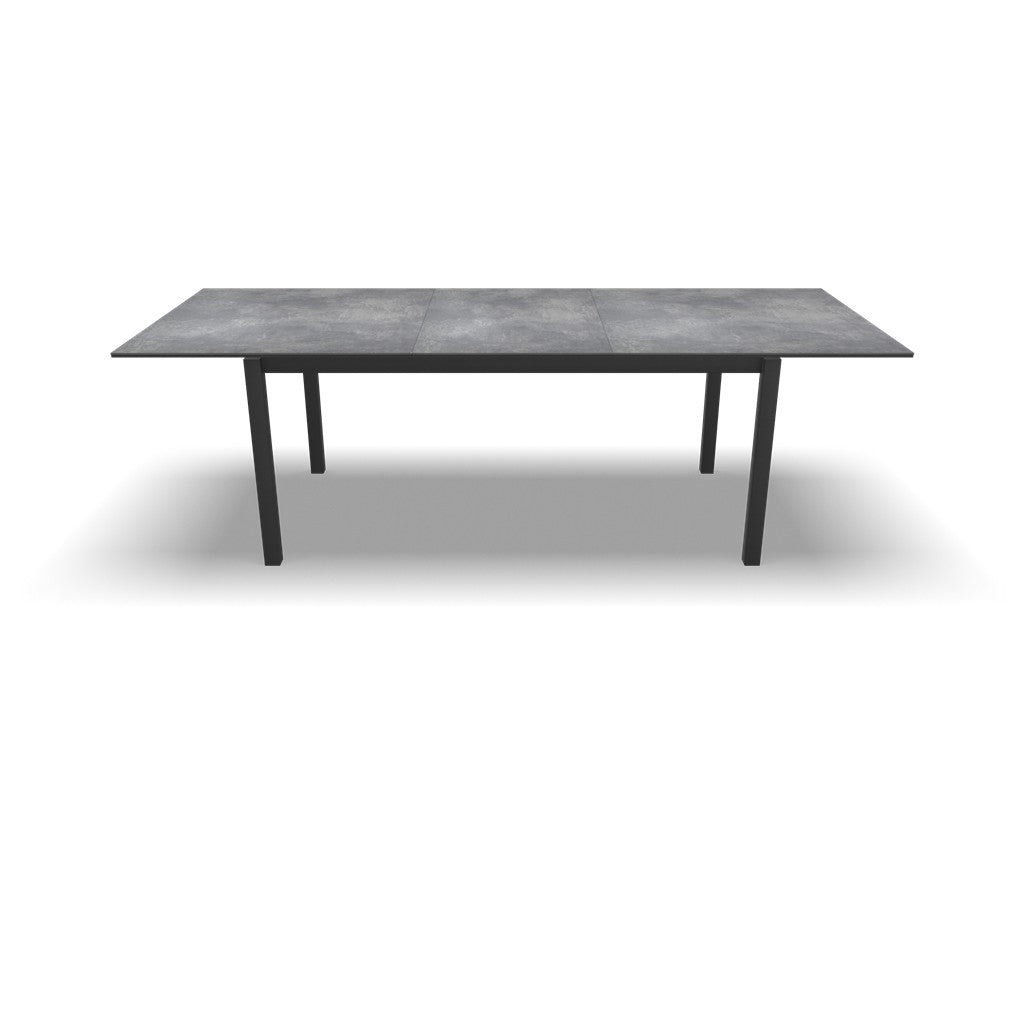 Rechthoekige uittrektafel met grijs betonkleurig blad en zwarte poten