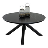Ronde eettafel met donkergrijs marmerlook blad en zwarte poten, met servies bovenop