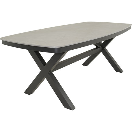 Ovale eettafel met lichtgrijs blad en zwart onderstel in kruispootvorm