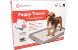 Verpakking met trainingsmatten en grijze opvangbak voor hond