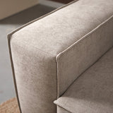 Chaise longue met lichtbeige stoffen zitting en afgeronde hoek, zichtbare naden