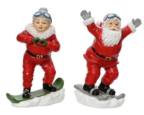 Kerstman en kerstvrouw op snowboard, rode outfit met witte details
