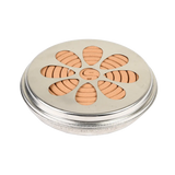 Ronde zinken deksel met citronella-spiralen, bovenaanzicht