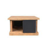 Salontafel met houtkleurig blad en open vak; zwarte deurpaneel aan de zijkant.