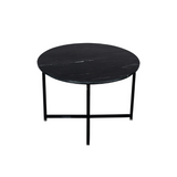 Ronde salontafel met zwart gemarmerd blad en zwart metalen poten met open midden.