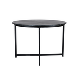 Ronde salontafel met donker gemarmerd blad en zwart metalen onderstel met vier poten.