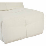 Relaxfauteuil met zachte arm- en rugkussens, lichte stof met doorgestikte naden.