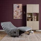 Grijze relaxfauteuil met opklapbare voetsteun en stoffen bekleding